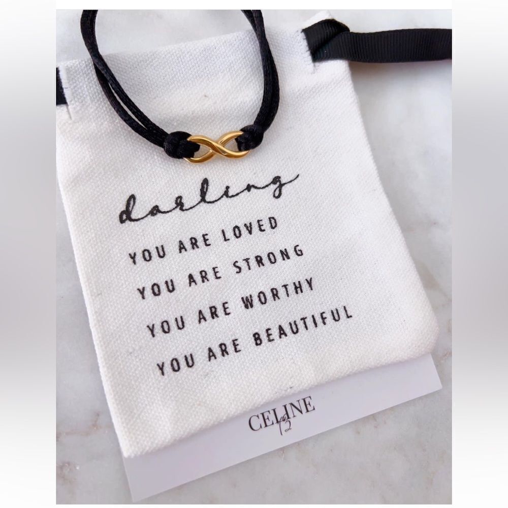 CELINE13 Women’s Black String Bracelet with Titanium Steel Infinity Charm +Pouch